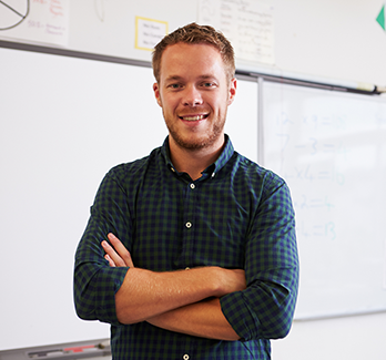 Male teacher in classroom