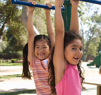 two girls on a playground