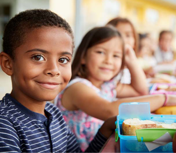 students eating lunches